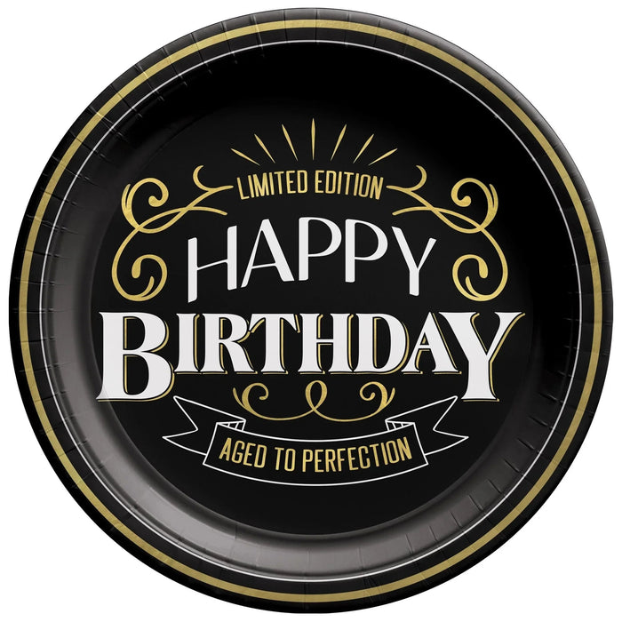 Black round plate with gold trim and decorative swirls, white text reading "Happy Birthday" and "Limited Edition," and a banner stating "Aged to Perfection.