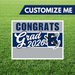 Graduation-themed customizable yard sign with 'Congrats Grad 2026' text on a grass background.