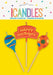 Unique Candles birthday candle set featuring three colorful candles: a red "Happy Birthday" banner-shaped candle in the center, a blue spiral-striped balloon candle on the left, and an orange polka-dotted balloon candle on the right.