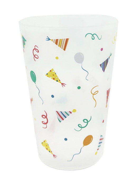 Clear plastic cup decorated with colorful party hats, balloons, confetti, and curled ribbons in red, yellow, green, and blue throughout.