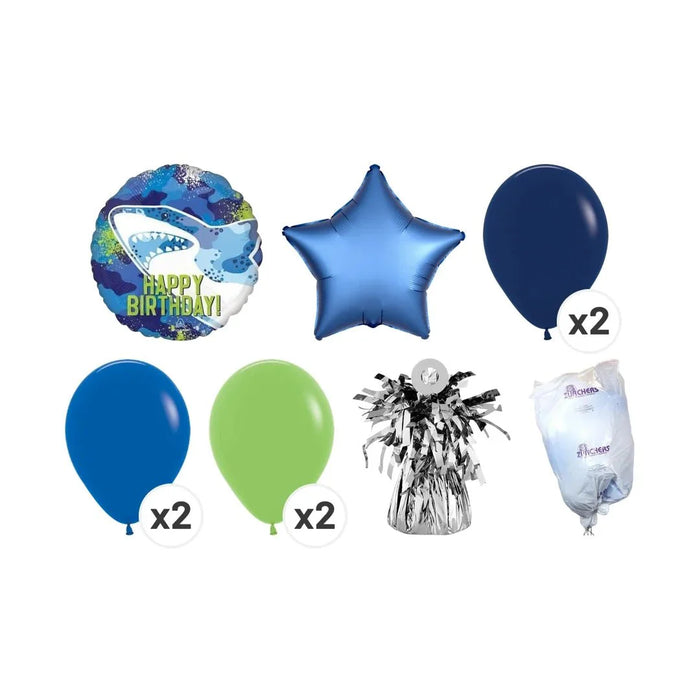 Shark-themed birthday balloon bouquet containing a round "Happy Birthday" shark foil balloon, blue star foil balloon, two dark blue latex balloons, two lime green latex balloons, a silver tassel weight, and a clear balloon pump.