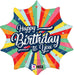 Colorful star-shaped mylar balloon featuring radiating stripes in yellow, red, orange, green, pink, and navy blue with scattered stars and "Happy Birthday to You" text in white script lettering.