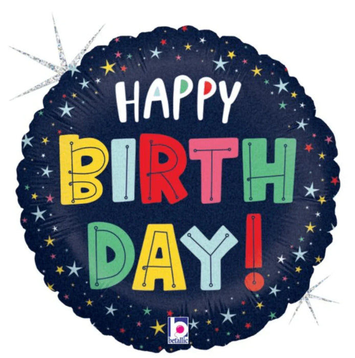 Colorful "Happy Birthday" mylar balloon with multicolored letters on a dark blue background decorated with stars and sparkle effects.