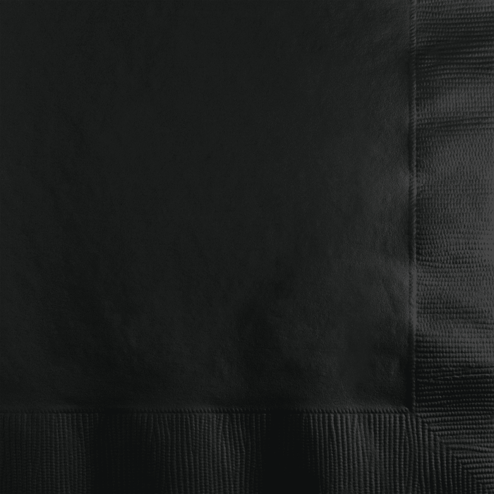 Stack of black velvet beverage napkins with ribbed texture visible on the edges and layered arrangement.