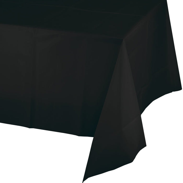 Black velvet rectangular tablecloth draped to show its soft texture and deep black color against a white background.