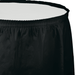 Black velvet tableskirt with elastic band waistline and vertical pleated panels along the bottom edge.