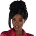 Black beehive updo hairpiece with clip-in side bangs and long straight ponytail extension, shown on a model with burgundy eyeshadow and red shirt against white background.