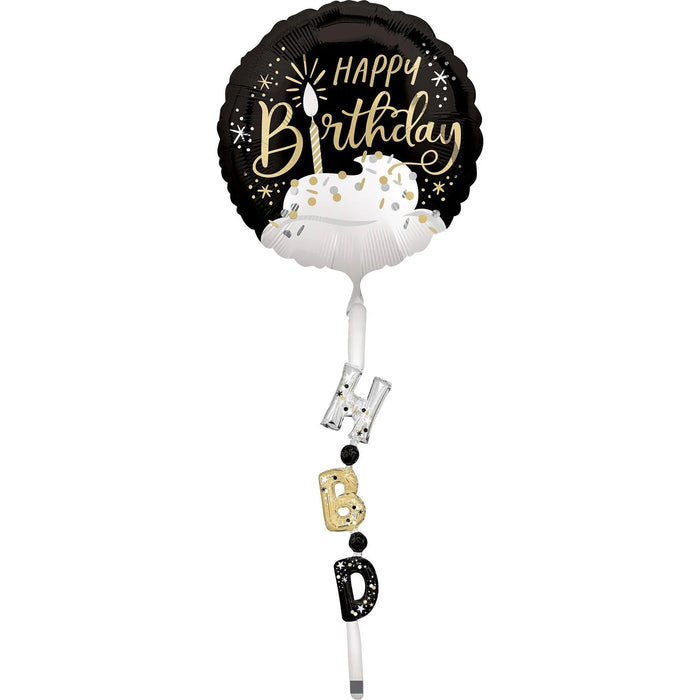 Black and gold "Happy Birthday" foil balloon with white candle design, featuring a dangling tail with silver, gold, and black letter charms spelling "B-D".