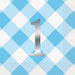 Silver number one against a blue and white gingham diamond pattern background with matching napkins visible at the edges.