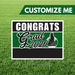 Graduation-themed customizable sign with 'Congrats Grad 2026' on a grass background