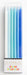 Box of 12 blue gradient taper candles with holders, ranging from white to deep blue, labeled "Party Partywares" on the packaging.