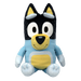 Plush toy of a black and yellow dog character wearing a light blue shirt with yellow belly patch and white paws, sitting upright with a friendly expression.