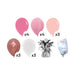 Pink and white latex balloons in varying shades alongside a silver tassel weight and helium tank, arranged in a flat lay display showing four hot pink, four light pink, three peach, three rose gold, and three white balloons.