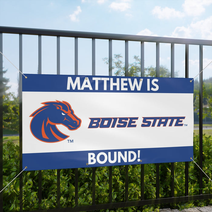 Boise State-themed banner with a horse logo and text on a fence