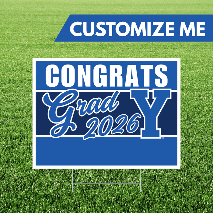 Graduation-themed sign with 'Congrats Grad 2026' on a grass background