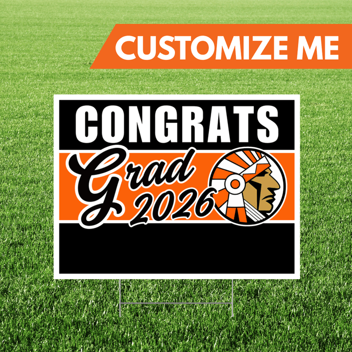 Graduation-themed sign with 'Congrats Grad 2026' on a grass background