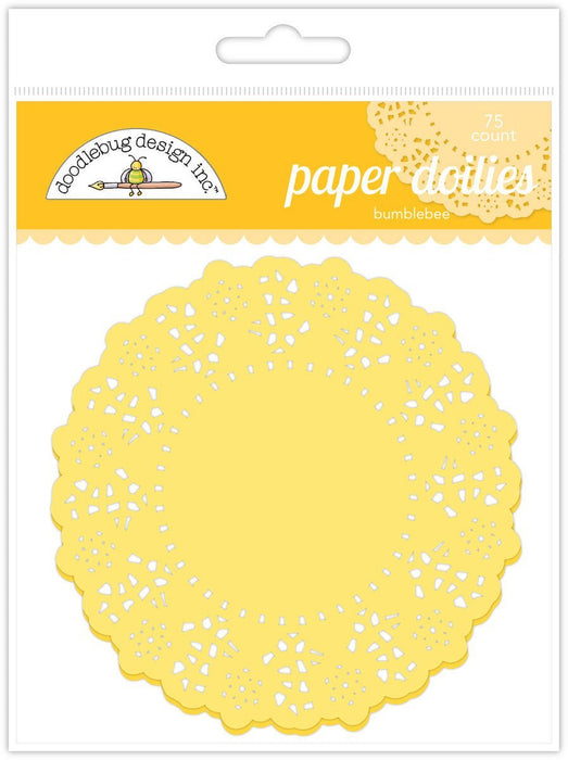Package of 75 yellow paper doilies with white eyelet cutout pattern and scalloped edges, branded as Doodlebug Design Inc. Paper Doilies Bumblebee collection.