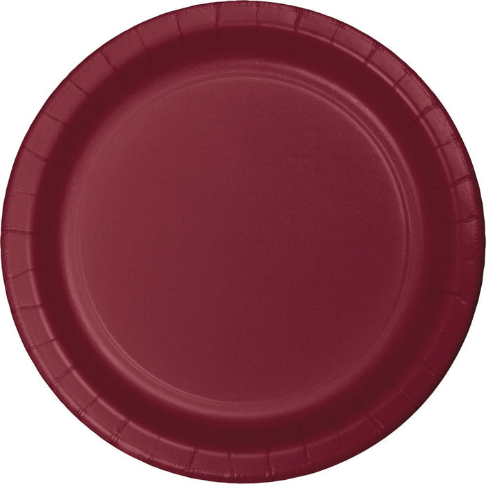 Deep burgundy paper plate with a ridged rim and slightly recessed center, shown from above.
