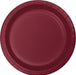 Burgundy paper plate with ridged edges and a subtle center circle design, shown as a single item from above.