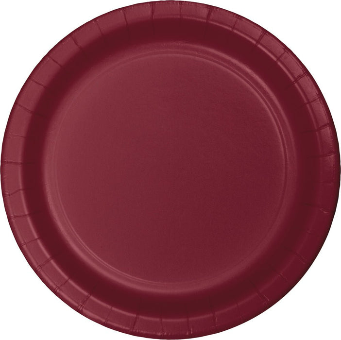 Burgundy disposable paper plate with a ridged rim and circular well design, shown from above.
