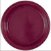 Burgundy plastic dinner plate with a ridged rim, shown from above against a white background.