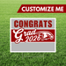 Graduation-themed customizable sign with 'Congrats Grad 2026' on a grass background