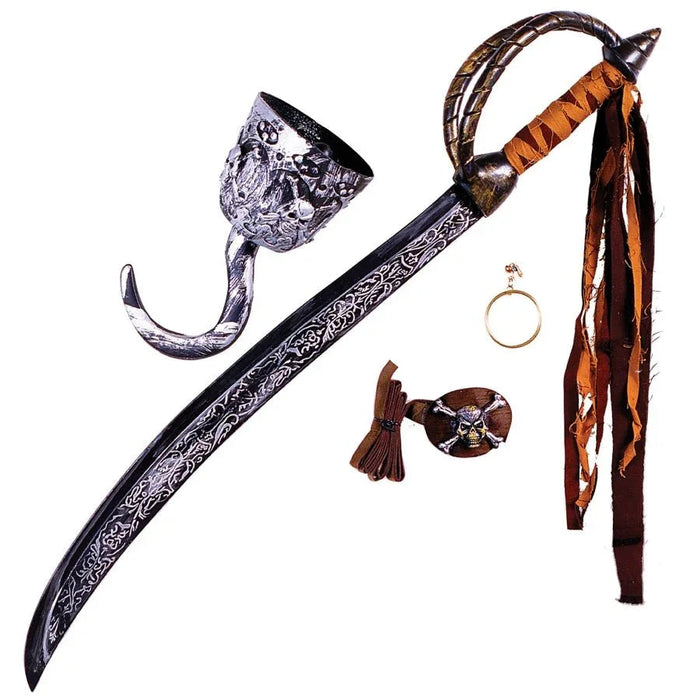 Five pirate costume accessories arranged on white: ornate curved sword with decorative blade, curved hook weapon with wrapped handle and dangling ribbons, gold ring, and brown skull medallion with rope bow.