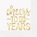 Gold foil napkins with "cheers to 50 years" text in script and block lettering on a white background with dotted border pattern.