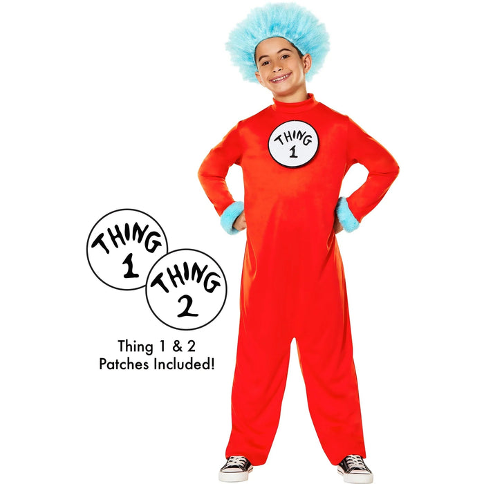 Child wearing red jumpsuit with blue fuzzy hair and "Thing 1" chest patch, includes detachable "Thing 2" patch.