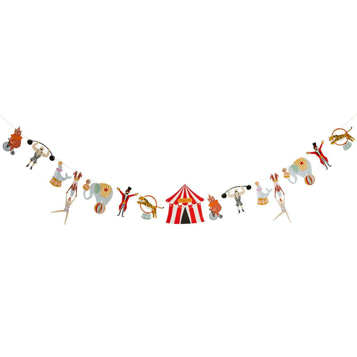 Colorful circus-themed garland banner featuring acrobats, animals, hot air balloons, and a red and white striped tent centerpiece strung together in a horizontal line.