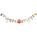 Colorful circus-themed garland banner featuring acrobats, animals, hot air balloons, and a red and white striped tent centerpiece strung together in a horizontal line.