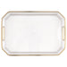 Clear rectangular serving tray with gold-tone handles and rim, featuring a white ribbed border and smooth center surface.