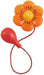 Orange flower with yellow center and black details attached to a red bulb and cord for squirting water.