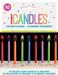 Box of 10 color flame birthday candles in assorted bright colors including red, purple, orange, green, yellow, and blue with matching holders displayed against a colorful confetti background.
