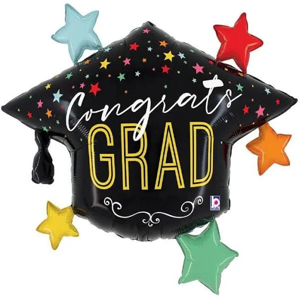 Black graduation cap-shaped mylar balloon with "Congrats GRAD" in white and gold lettering, surrounded by colorful stars in blue, red, yellow, orange, and green with a tassel accent.