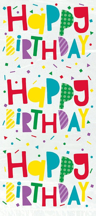 Repeating pattern of three colorful Happy Birthday designs on white cello bags with multicolored confetti and geometric shapes throughout.
