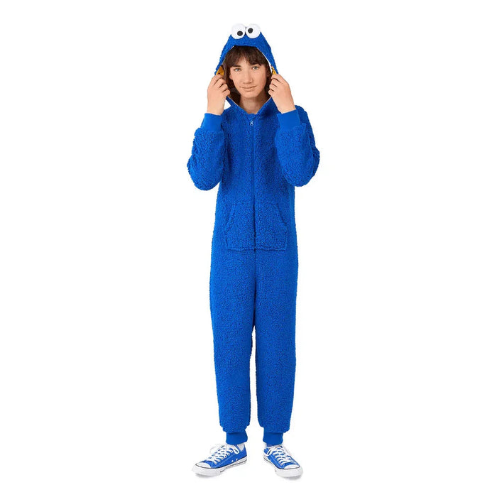 Bright blue textured onesie costume with attached Cookie Monster hood featuring large googly eyes, paired with blue sneakers.
