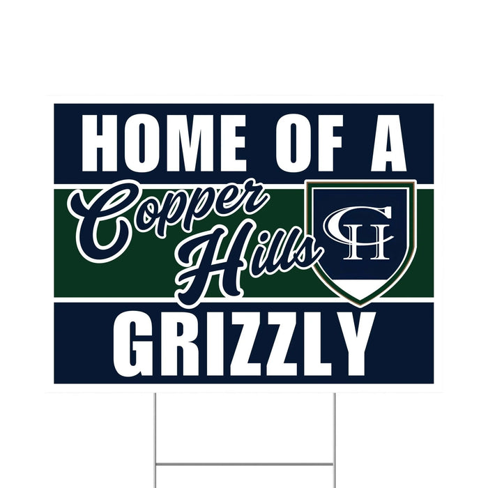 Copper Hills Grizzly yard sign featuring navy blue and green horizontal stripes with white text reading "Home of a Copper Hills Grizzly" and a shield logo.
