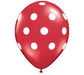 Red latex balloon with white polka dots throughout, featuring a glossy finish and tied knot at the bottom.