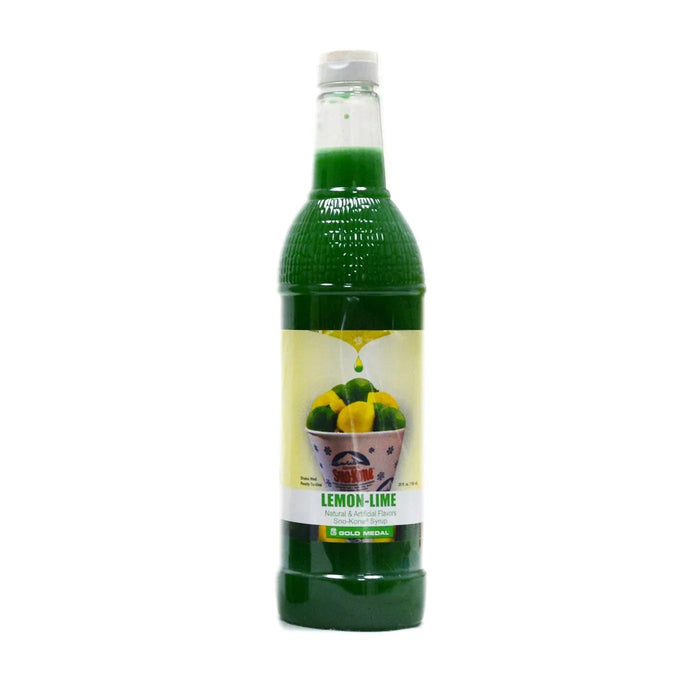 Green glass bottle filled with bright green lemon-lime flavored syrup, featuring a yellow and white label with a bowl of lemons and limes, and gold medal branding.