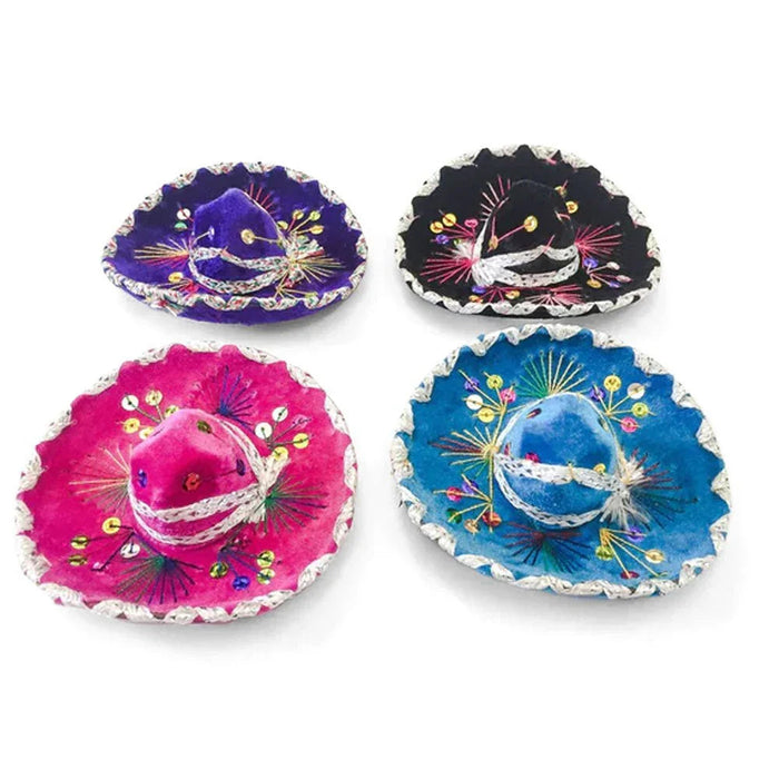 Four decorative miniature sombreros in purple, black, hot pink, and blue with white scalloped trim, embroidered details, and colorful beaded embellishments arranged in a grid layout.