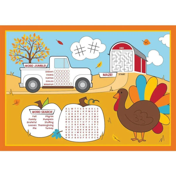 Colorful paper placemat featuring autumn-themed activities including a word jumble on a truck, tic-tac-toe in a cloud, a maze in a barn structure, and a word search grid with a turkey illustration on a sandy background.