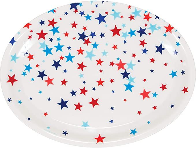 White oval plastic tray decorated with scattered red, navy blue, and light blue stars of varying sizes.