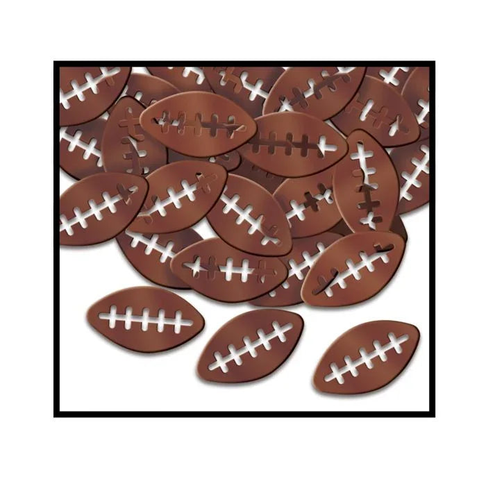 Brown foam football-shaped pieces with white stitching details scattered in a pile with three individual footballs displayed in front.