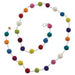 Colorful pom-pom garland with multicolored yarn balls in shades of pink, purple, blue, orange, yellow, green, and burgundy connected in a long strand.