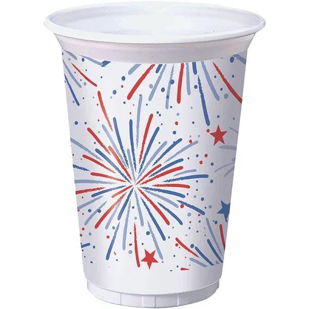 White plastic cup featuring red and blue firework bursts with scattered stars and confetti dots throughout the design.
