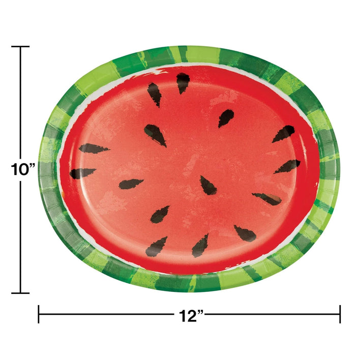 Oval paper plates measuring 12 by 10 inches with a bright red center decorated with black seed details and a green rind border.