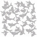 Gray glitter shark-shaped confetti pieces scattered on a white background.