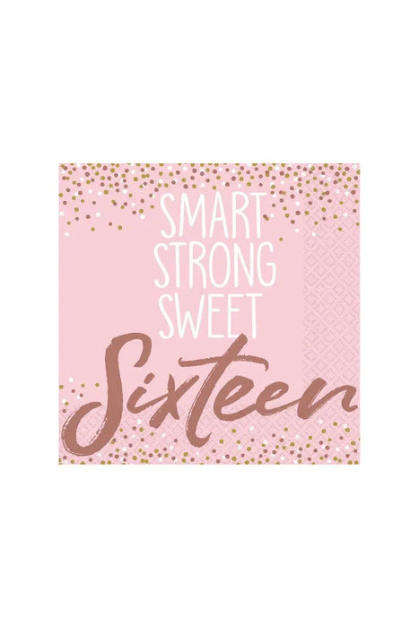 Pink cocktail napkin with white text reading "Smart Strong Sweet Sixteen" and gold confetti design scattered across the top and bottom edges.