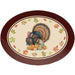 Oval dark brown plastic serving tray with cream-colored center featuring an illustrated turkey with spread tail feathers surrounded by autumn leaves and small pumpkins.